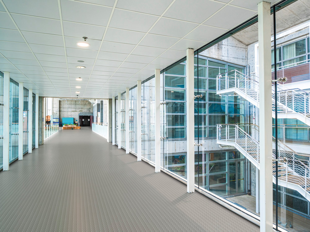 norament 926 pastille rubber flooring in an aisle