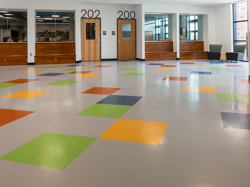 Latrobe Elementary School: Throughout the campus, the school's branded colors create a cohesive design wihth splashes of color everywhere