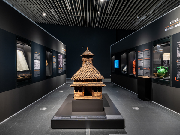 Model of a wooden Ruthene church within an exhibition room